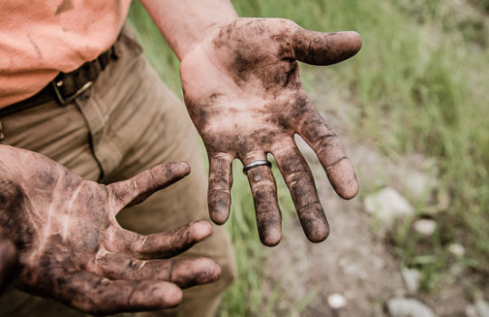 Man with dirty hands